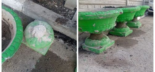 Во дворе дома № 69 на улице Татарской восстановили разбитые вазоны, а теперь готовятся к покраске